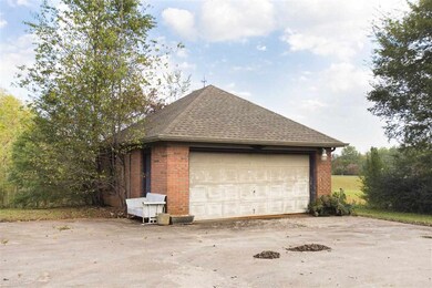In addition to the over sized attached garage there is a detached garage.