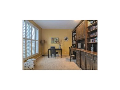 OFFICE W/BUILT-INS & PLANTATION SHUTTERS!