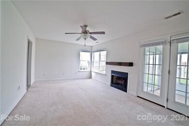 Full View of Living Room with Door to screened in 