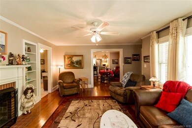 Living Room with new gas logs is open to Dining Ro