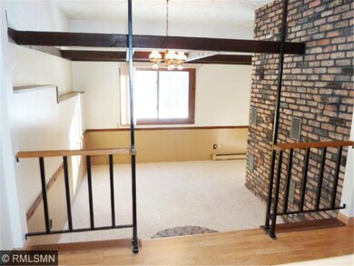 Beautiful beamed ceilings add a rustic feel to thi