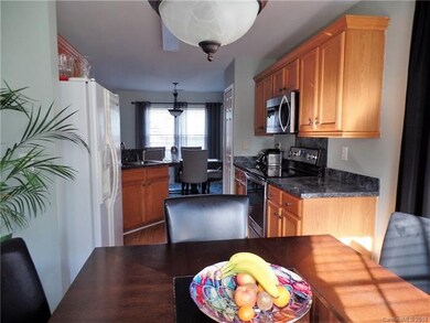 Kitchen has large Breakfast Nook located in triple