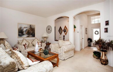 LIVING ROOM TO FOYER