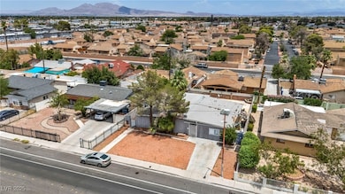 Aerial view of residential area featuring mountain