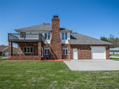 3rd Garage Door and Extra Driveway!
