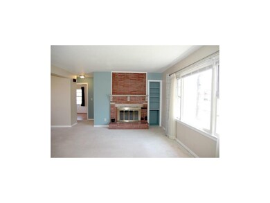Great brick fireplace with accent wall. Let the su