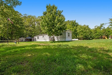 781 W 11 Mile Rd, Bitely, MI 49309 - photo 2