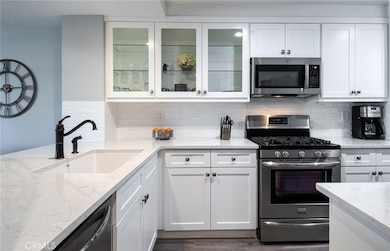 Beautiful kitchen with ample storage.