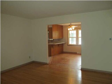 View from living room into kitchen/eating area.