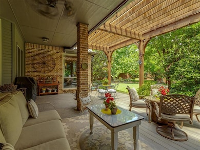 This lovely outdoor seating area offers plenty of privacy and shade.