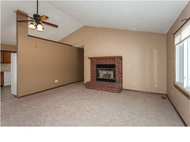 Living room with vaulted ceilings.