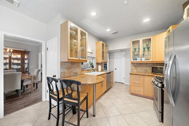 This modern kitchen features stainless steel appli