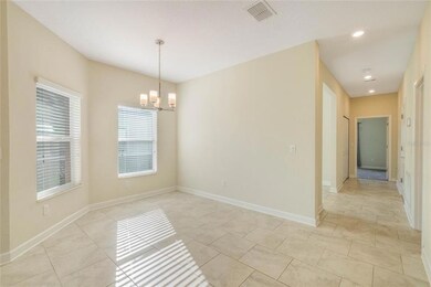 Dining room opens to the kitchen and living room for easy entertaining