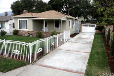 View of home and driveway leading to rear yard! 
