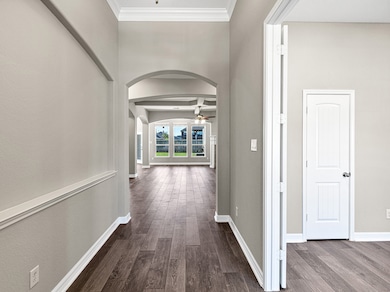 Entryway into home with view of family room