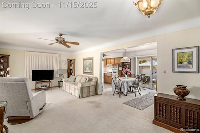 Living area with light colored carpet