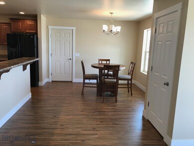 Dining room. Photo of similar home.