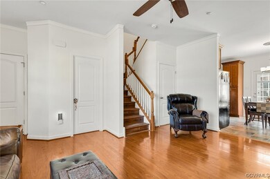 Family Room view looking upstairs and into kitchen