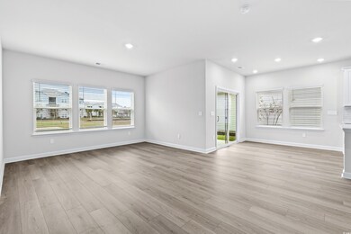 Unfurnished living room with light wood-type floor