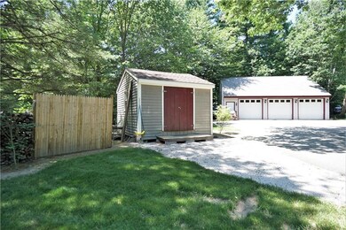 Property has a shed and a 3 car...