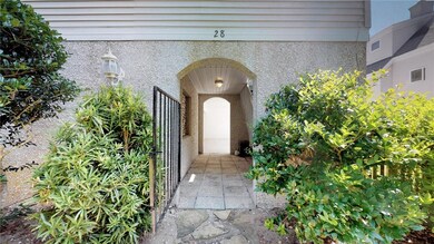 Gate leading to covered front entrance.