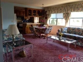 Living room, dining area, kitchen