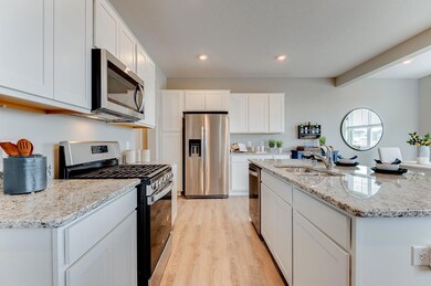 Space and function present in the designer kitchen. *Staged Model photo, actual selections and options may vary.