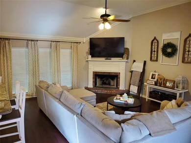 Spacious open living room with vaulted ceiling, co