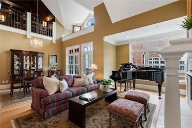 Living area with an inviting chandelier, a wealth 
