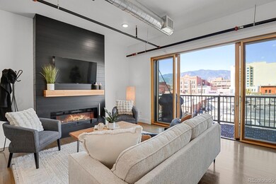 Sleek electric fireplace adds warmth and ambiance to the living area