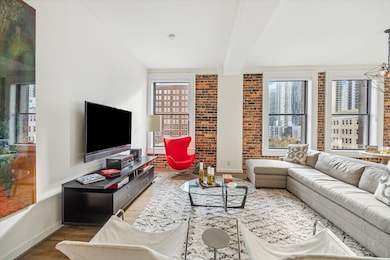 View of the living room TV area in Bayou Lofts, sh