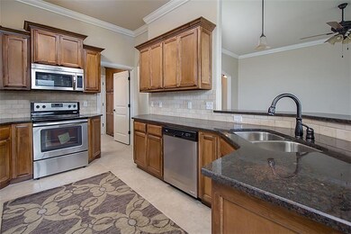 Spacious kitchen opens up to living room