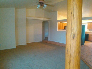 Living room looking into kitchen