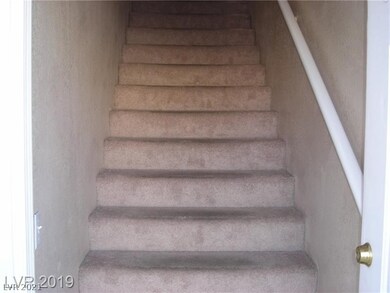 Stairwell Leads to Condo Upstairs