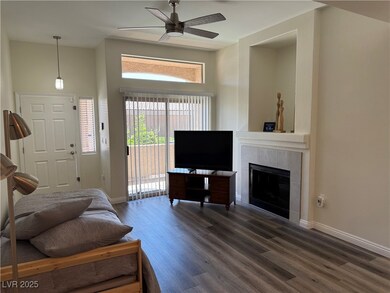Living room featuring wood finished floors, ceilin