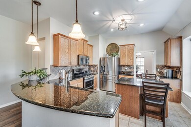 Kitchen with appliances with stainless steel finis