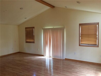 spacious 16x23 vaulted great room off the kitchen