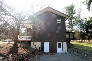 Eastside elevation with at grade basement door