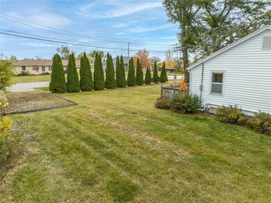 Gorgeous flat yard, garden space, new siding and r
