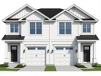 View of front of home featuring metal roof, an att