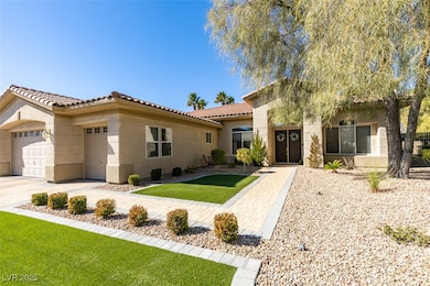 Mediterranean / spanish house featuring driveway,