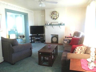 Living Room. 17 x 13  Wall to wall carpeting, deco