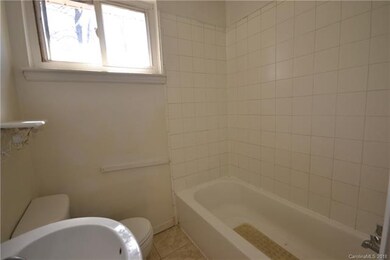 Bathroom has combination tub/shower