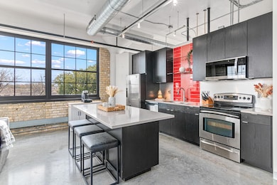 Open concept kitchen with big island to make meal prep a snap.  Or, entertain family and friends in this oversized space with the island anchoring your food and drink.