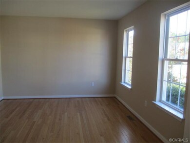 Formal Living Room with hardwood flooring