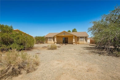 View of front of house featuring stucco siding
