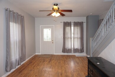 Living Rm with new floors, newer front door, newer