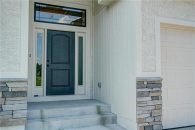 Front entrance to this beautiful Ranch style home