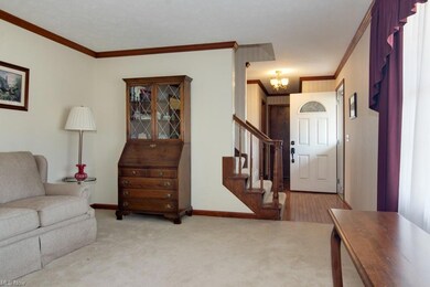 A large foyer greets you as enter the home. The li