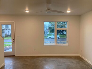 Empty room featuring ceiling fan